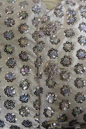 Satin with Silver Sequin Flower santa claus material